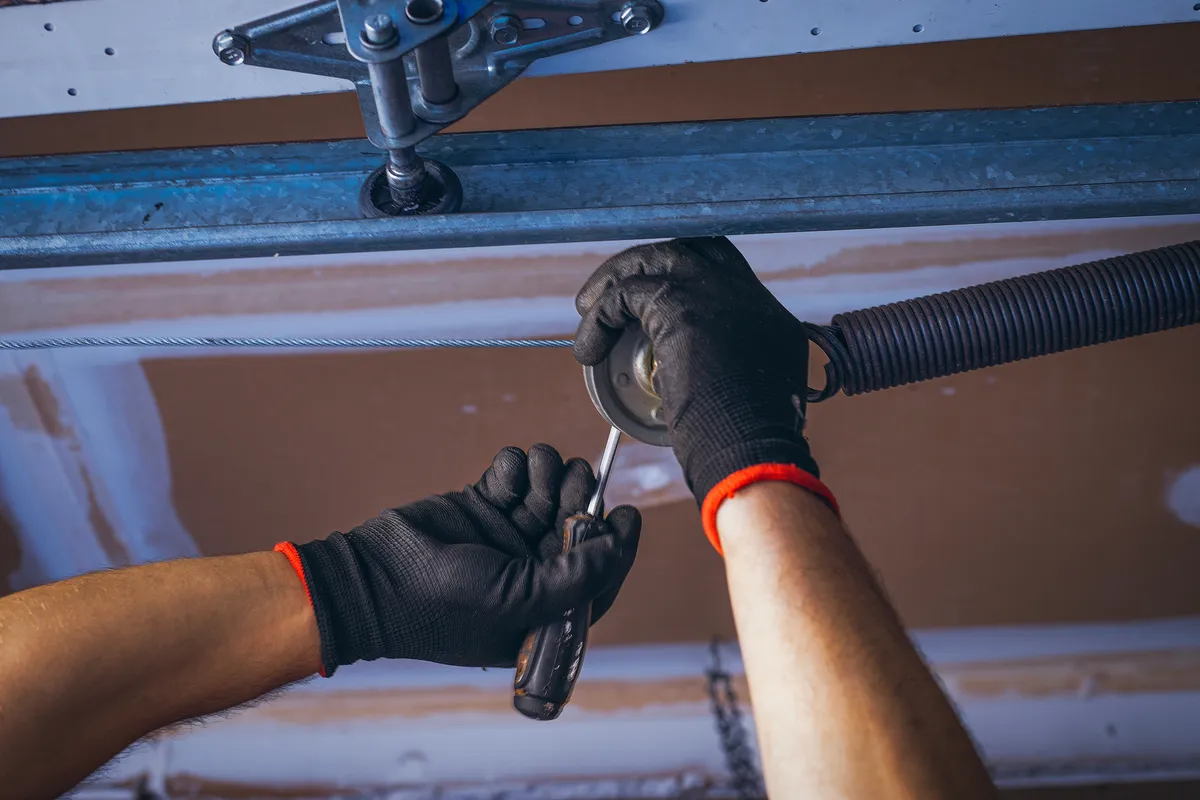 Garage door spring repair close-up